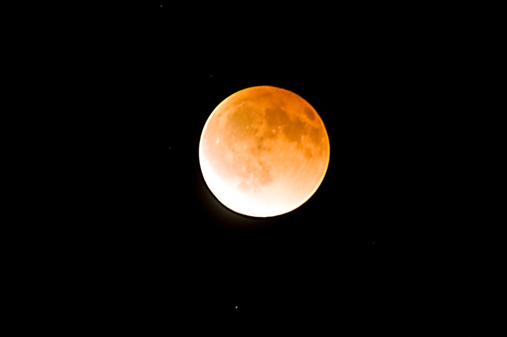 Lunar Eclipse Emerging out of total